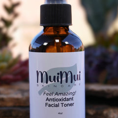 Facial toner bottle with brown glass, black cap, and white label with MuiMui text