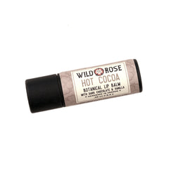 Lip balm tube with black cap, tan label, and Wild Rose text