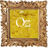 Small glass jar with black sifter lid containing 3g of pigmented mineral eye shadow in rich matte finish