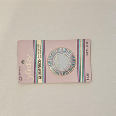 Side view of vintage Yardley Mod Glimmerick eyeshadow in Little Boy Blue, showcasing mint condition card packaging