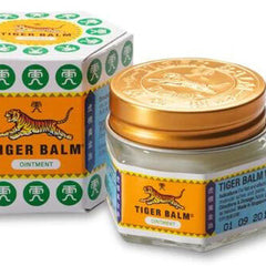 Close-up of White Tiger Balm Skin Relief in a sleek white tube with gold accents, showcasing its smooth texture and 30g size