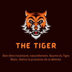 White Tiger Balm Skin Relief jar with gold lid displayed alongside complementary skincare products on marble surface