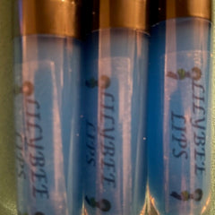 Lip gloss tubes with blue liquid, black cap, and "CLEVBE LIPS" text visible.