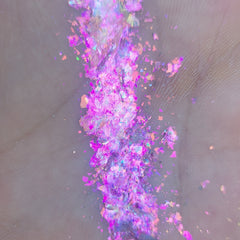 Side view of Flakes Eye Shadow pot PGO01 showcasing its smooth satin finish and compact circular case