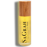 Facial Cleanser bottle with yellow liquid, wooden cap, and SaGrah Beauty text