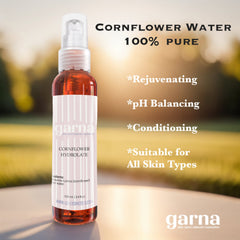 Cornflower water spray bottle, clear with red liquid, white pump, garna brand label