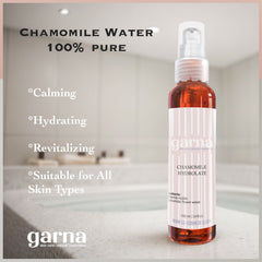 Chamomile water bottle, amber liquid, white and pink label, Garna brand
