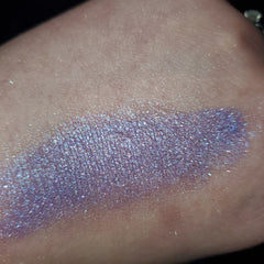 Side view of cereal-inspired eye shadow palette showcasing vibrant pastel shades in matte and shimmer finishes