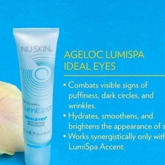 Eye cream tube, white and blue, with Nuskin and Ideal Eyes text visible