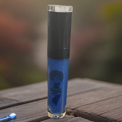 Lip gloss tube with blue liquid, black cap, and illustration on glass tube.