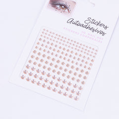 Gold vintage crystal face stickers in a pack with 165 adhesive stones for skin embellishment