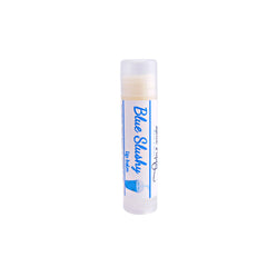Lip balm tube with blue and white label, clear plastic cap, and Blue Slushy text