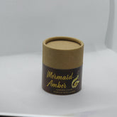 Face powder container, brown cardboard, Mermaid Amber text, cylindrical shape
