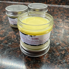 Tallow balm in glass jar with metal lid, yellow balm, Tallowbee label visible