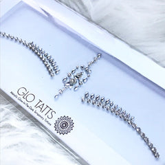 Face gems bindi, silver rhinestone style, GLO TATTS brand, on white backing