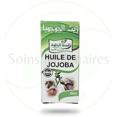 Close-up of golden jojoba oil droplet on fingertips, showcasing its silky texture and natural glow