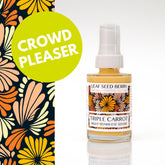 Eye serum bottle with yellow liquid, white cap, and floral label, Leaf Seed Berry brand