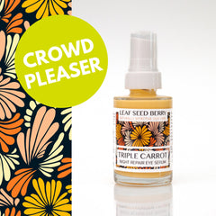 Eye serum bottle with yellow liquid, white cap, and floral label, Leaf Seed Berry brand