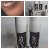 Lip gloss tubes with dark brown liquid, white cap, and Haye Tonise Beauty label