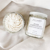 Whipped tallow sugar scrub with white cream, glass jar, and PURE SIMPLICITY label on linen