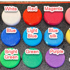 Round colored objects in white, red, magenta, blue, light blue, bright green, green, and purple with labels