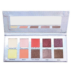 Eyeshadow palette with silver case, various colors including pink, red, and brown, with mirror
