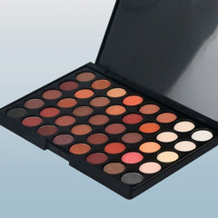 Close-up of 40 vibrant eyeshadow shades in matte, shimmer, and metallic finishes arranged in rectangular palette