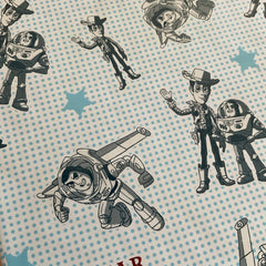 Toy Story pattern fabric with blue polka dots, Woody and Buzz Lightyear characters