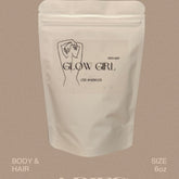 Face powder in white pouch with "GLOW GIRL" text and 6oz size