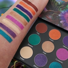 Eye shadow palette with colorful swatches on arm, and Abloom brand palette with round pans
