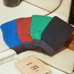 Close-up of textured Moroccan hammam glove with woven fibers for gentle skin exfoliation