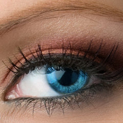 Burgundy red shimmer vegan eyeshadow in compact with rose gold detailing and reflective surface