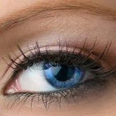 Peach tan eyeshadow compact with vibrant blue shimmer, vegan mineral makeup in sleek round case