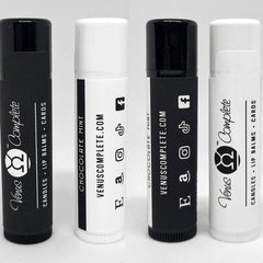 Lip balms with black and white tubes, Venus Complete branding, and social media icons