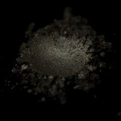 Close-up of vegan taupe shimmer eye shadow in compact with cool neutral pressed pigment and soft metallic finish