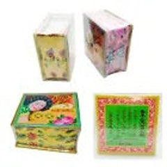 Boxes with floral patterns, pink and yellow colors, and clear wrapping for display