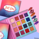 Eyeshadow palette with multiple colors, Prolux brand, open with swatches on pink background