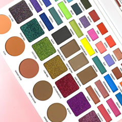 Eyeshadow palette with various colors, including matte, shimmer, and glitter finishes, in rectangular and round pans