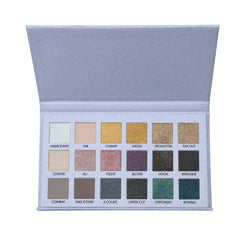 Eyeshadow palette with silver case, multiple colors, and labeled shades