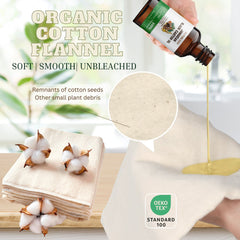 Organic cotton flannel, unbleached fabric, natural color, with oil being poured onto it.