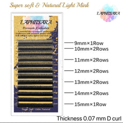 Premade eyelashes in black, with LAPHITSARA branding, arranged in rows by length and thickness