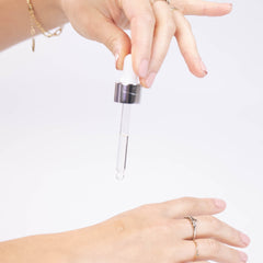 Detailed close-up of Weightless Dry Oil for All-Day Glow Skin Tone Improvement with Botanicals Squa