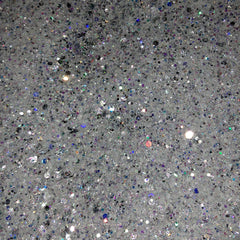 Glitter texture with white, silver, and iridescent sparkle details, close-up view