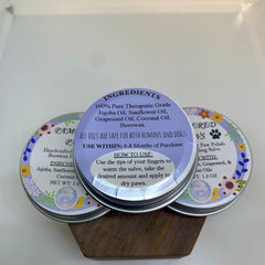 Paw salve tins, silver metal with purple labels, floral design, for paws.
