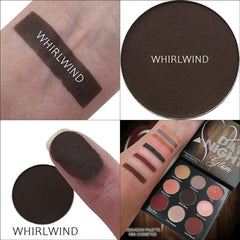 Close-up of matte whirlwind eyeshadow being applied to eyelid with a fluffy brush