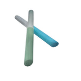 Eye makeup tubes, green and blue, ribbed texture, display or prop use