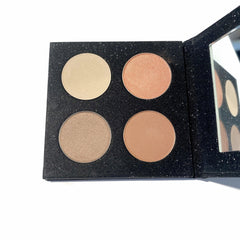Makeup palette with four circular shades in beige, peach, and brown colors, in a black glitter compact with mirror