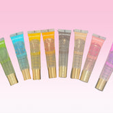 Lip gloss tubes in assorted colors with gold caps, Broadway brand visible