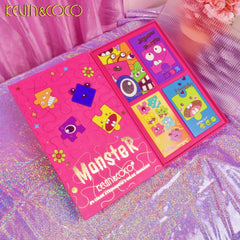 Eyeshadow palette with pink packaging, monster puzzle design, and Kevin & Coco logo visible