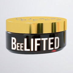 Cosmetic jar with gold lid, black body, and "BeeLIFTED" text in white lettering